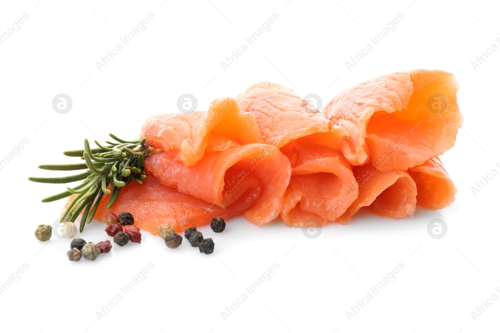 Photo of Fresh sliced salmon fillet with rosemary and pepper mix on white background