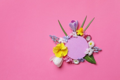 Photo of Flat lay composition with spring hyacinth flowers and blank card on color background, space for text