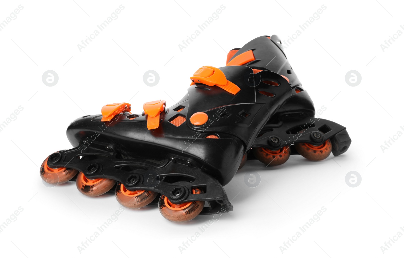 Photo of Pair of inline roller skates on white background