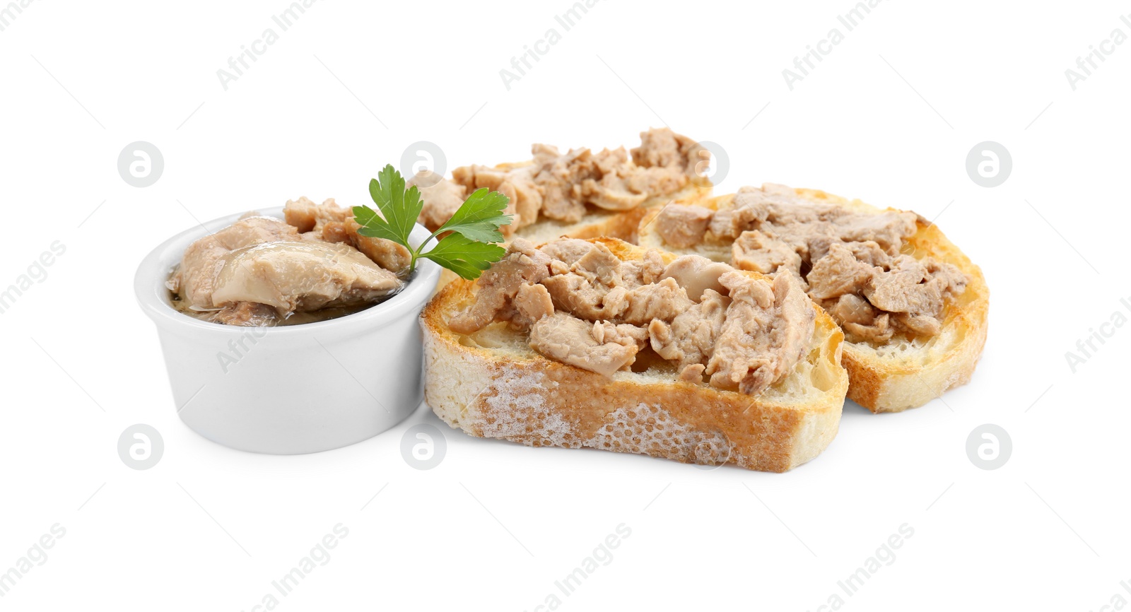 Photo of Tasty sandwiches with cod liver and parsley isolated on white