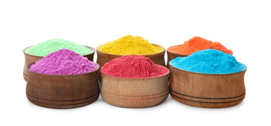 Photo of Colorful powder dyes in bowls on white background. Holi festival