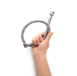 Plumber holding flexible hose on white background, closeup