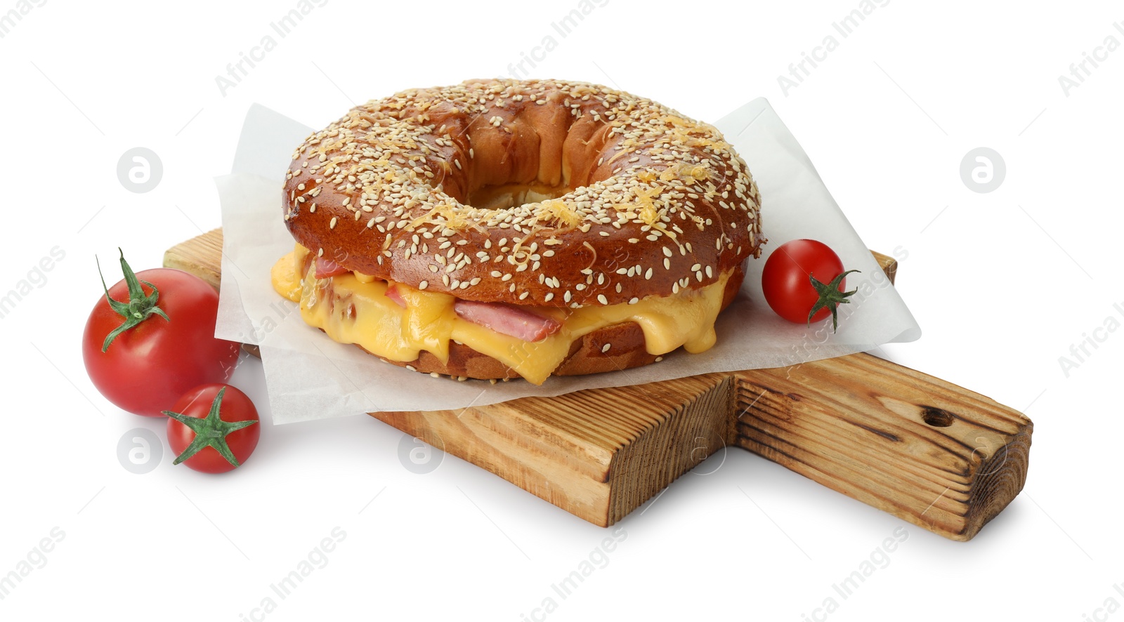 Photo of Delicious bagel with ham, cheese and tomatoes isolated on white