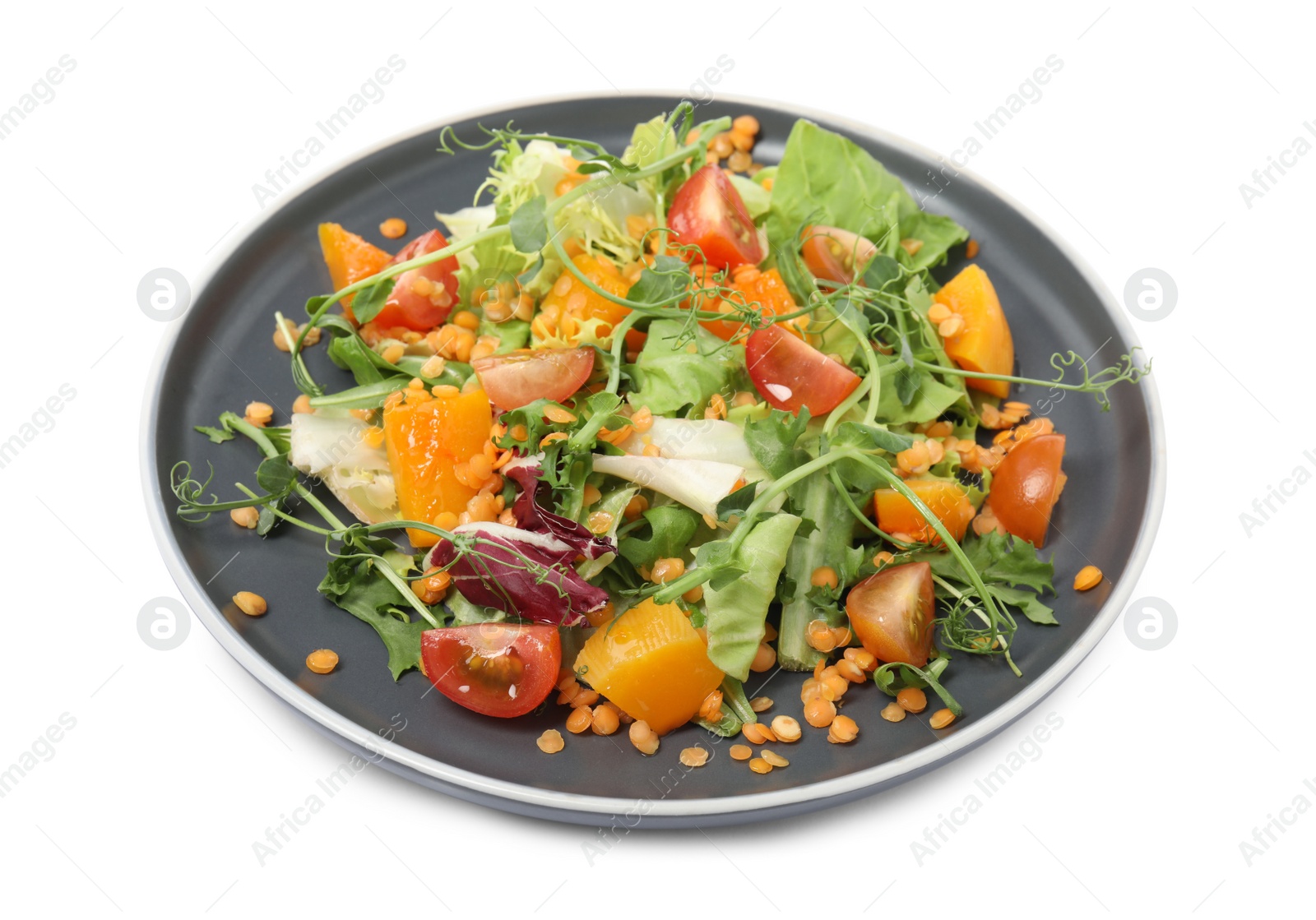 Photo of Plate of delicious salad with lentils and vegetables isolated on white