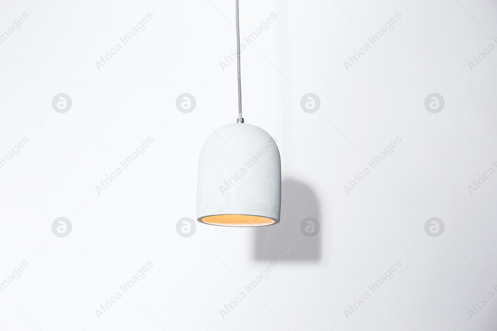 Photo of Modern hanging lamp, isolated on white. Idea for interior design