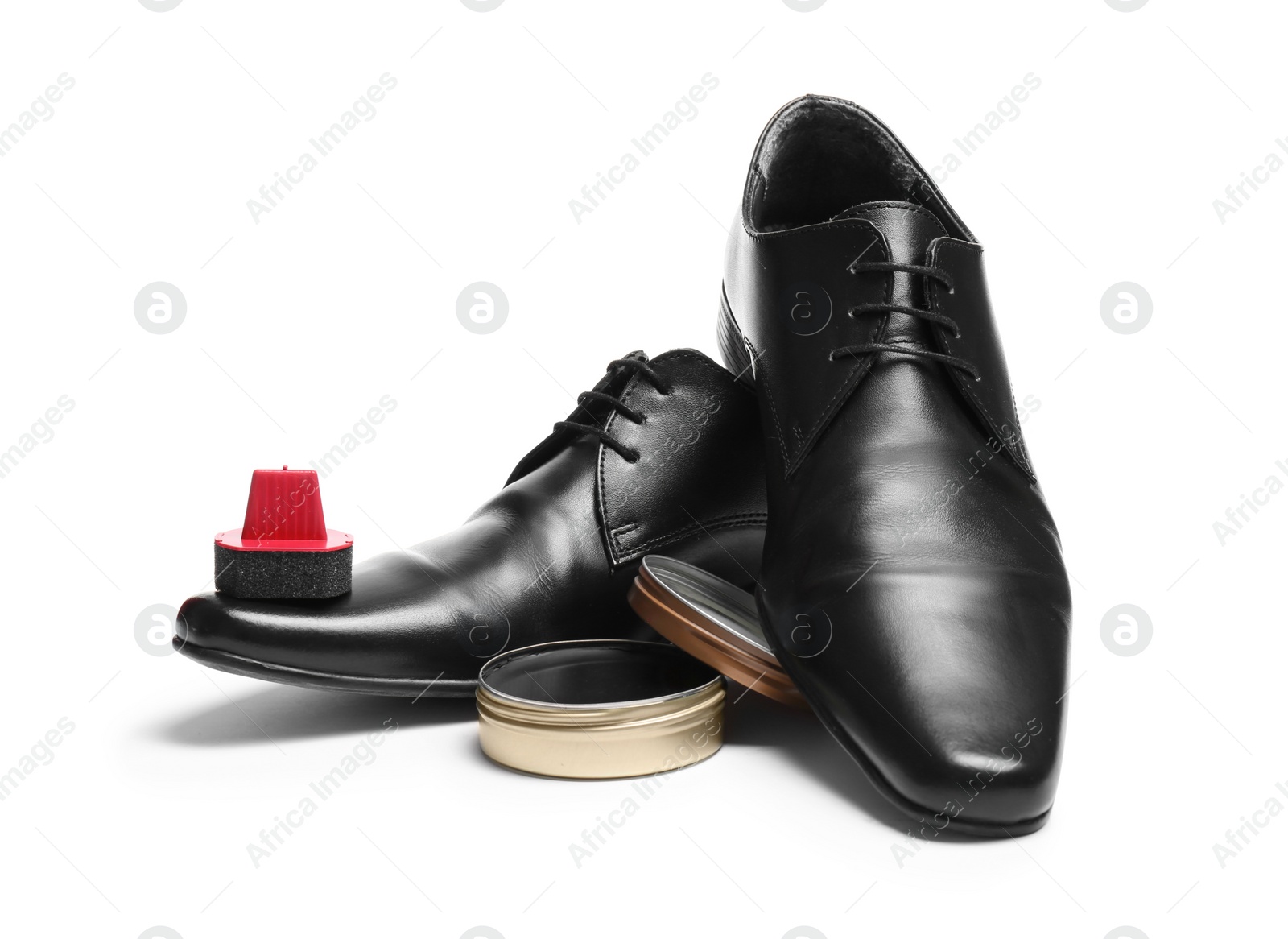 Photo of Stylish men's footwear and shoe care accessories on white background