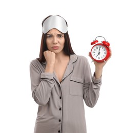 Photo of Emotional overslept woman with alarm clock on white background. Being late concept
