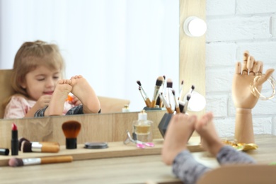 Cute little girl in dressing room