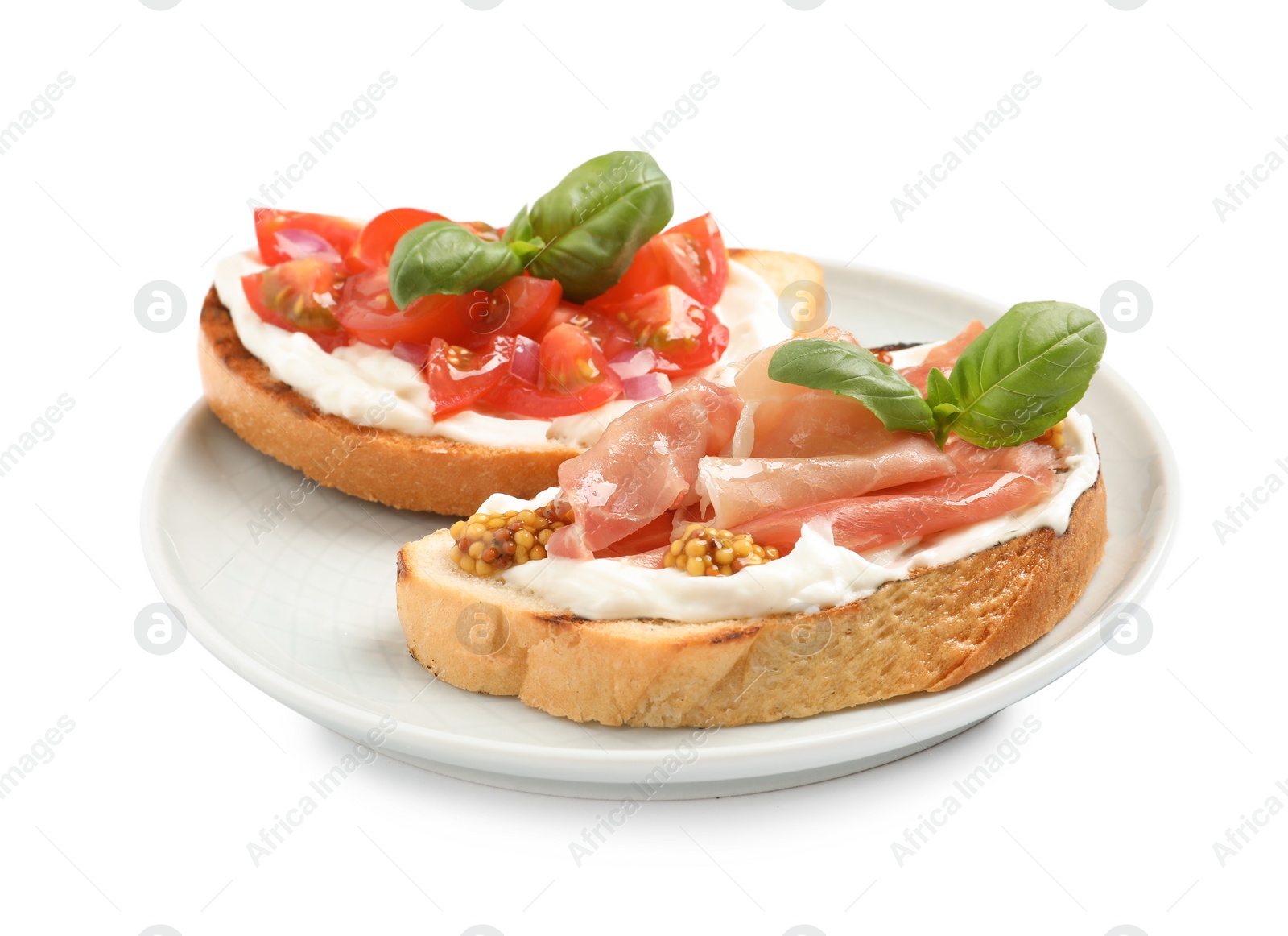 Photo of Plate with tasty bruschettas on white background