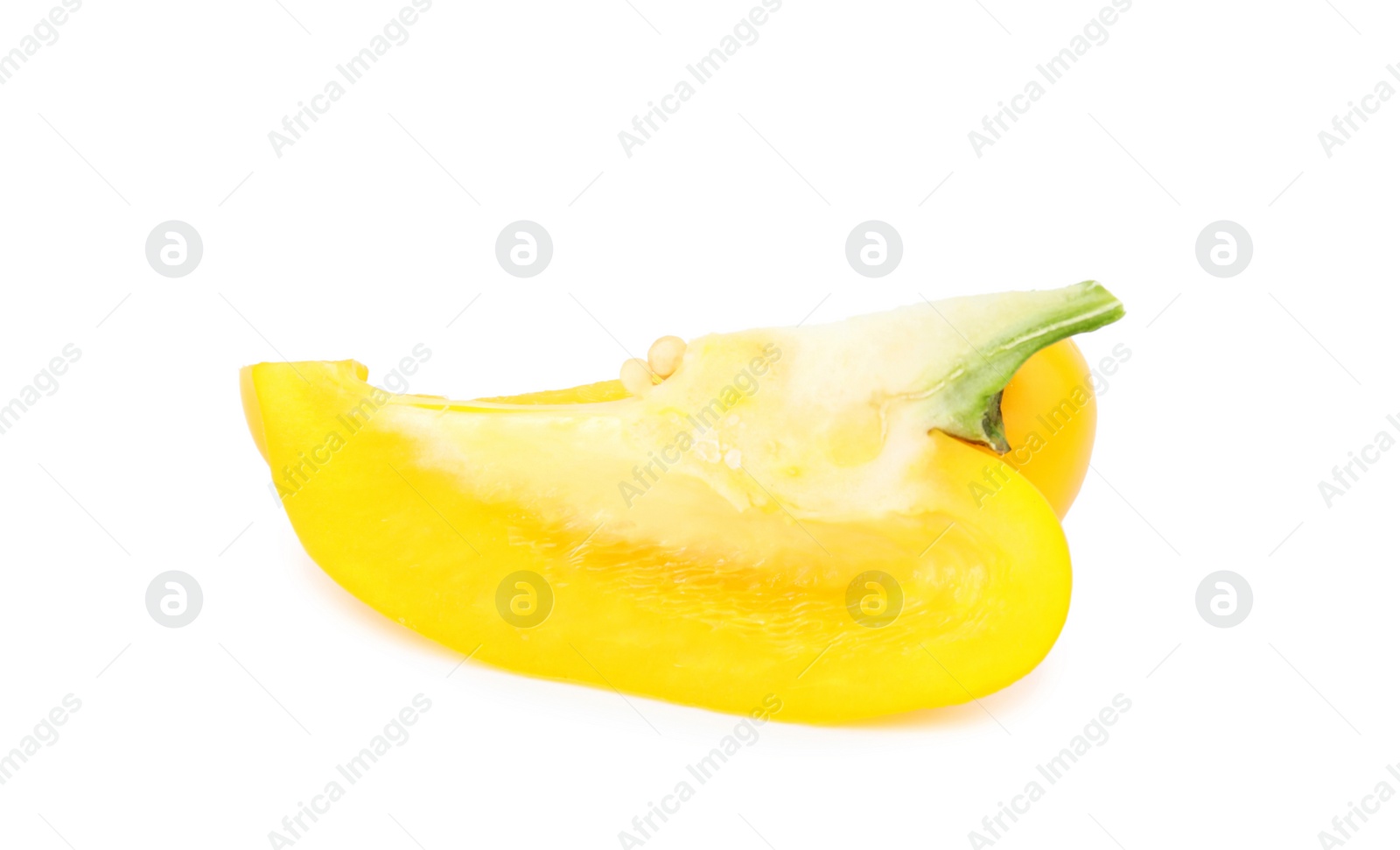 Photo of Cut yellow bell pepper with seeds isolated on white