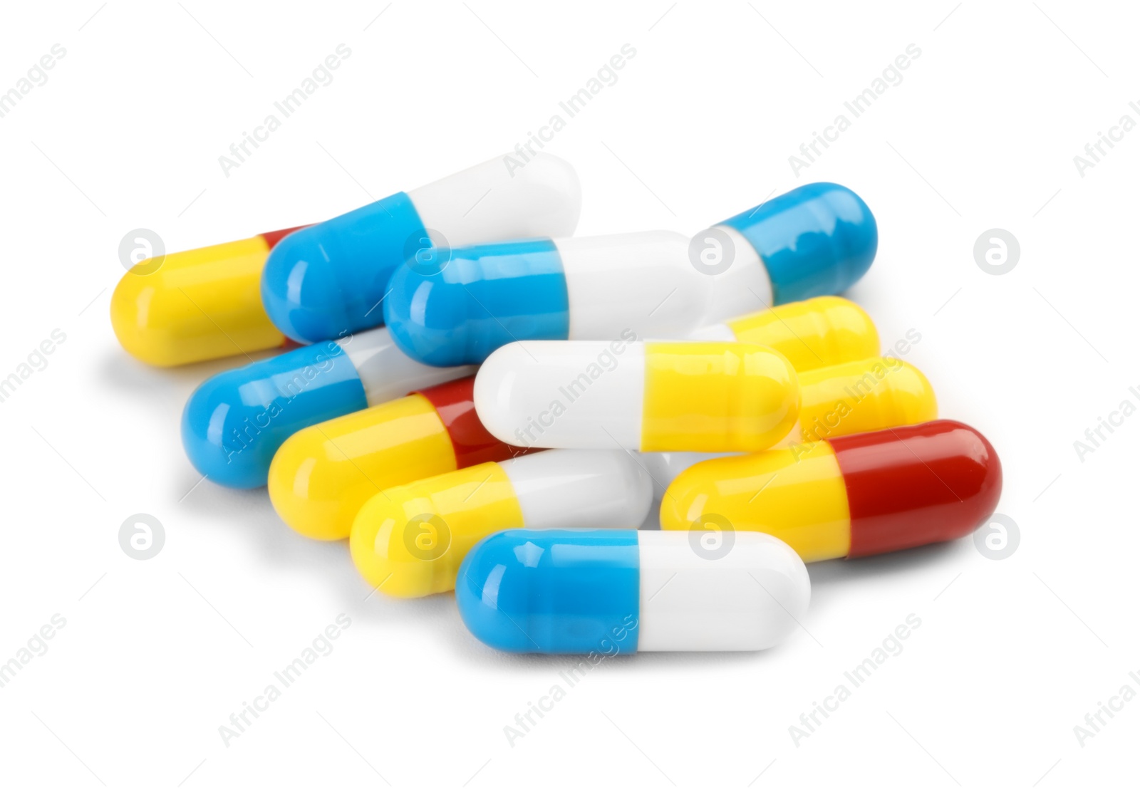 Photo of Many antibiotic pills isolated on white. Medicinal treatment