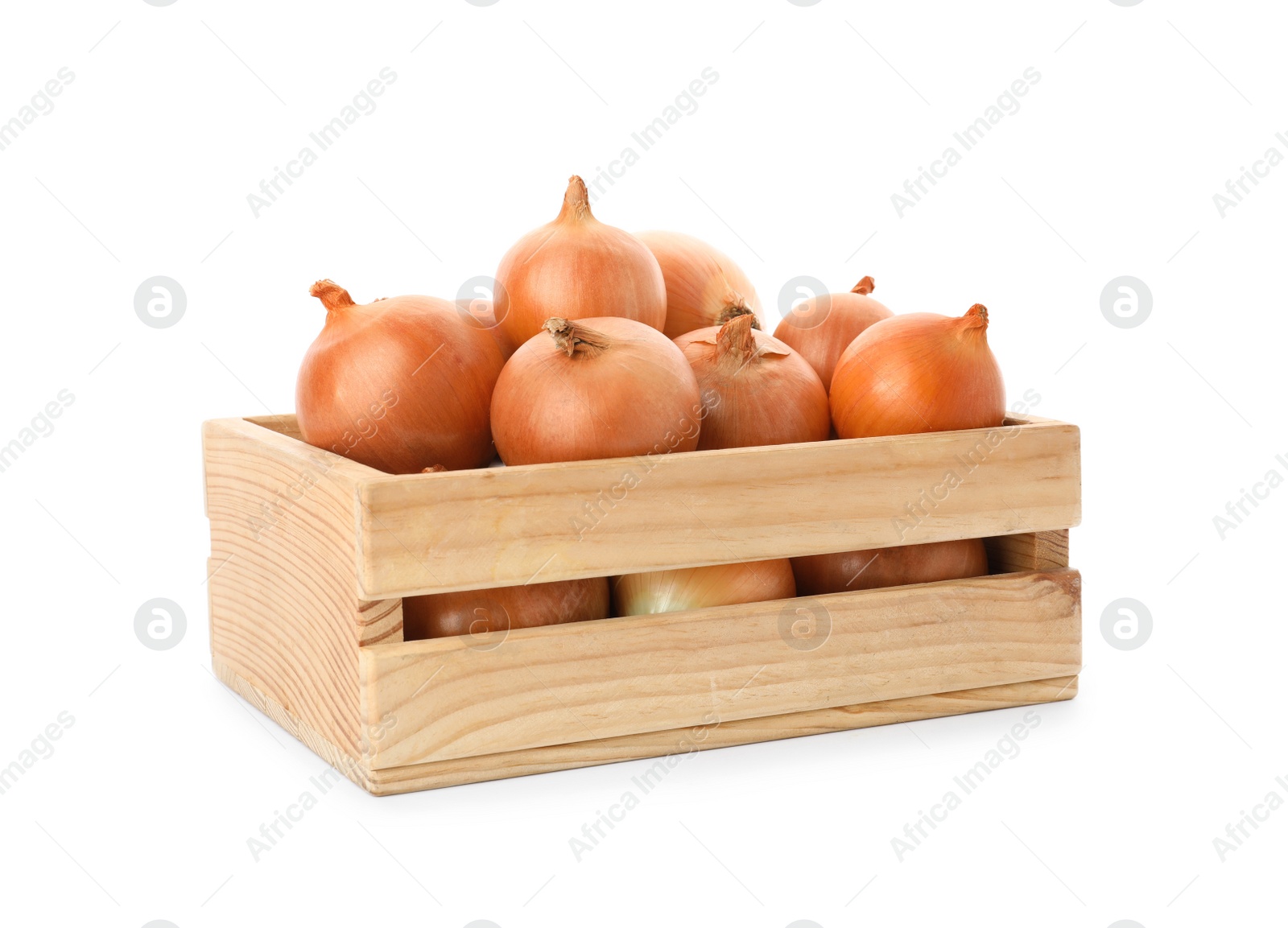 Photo of Fresh yellow onion bulbs in wooden crate isolated on white