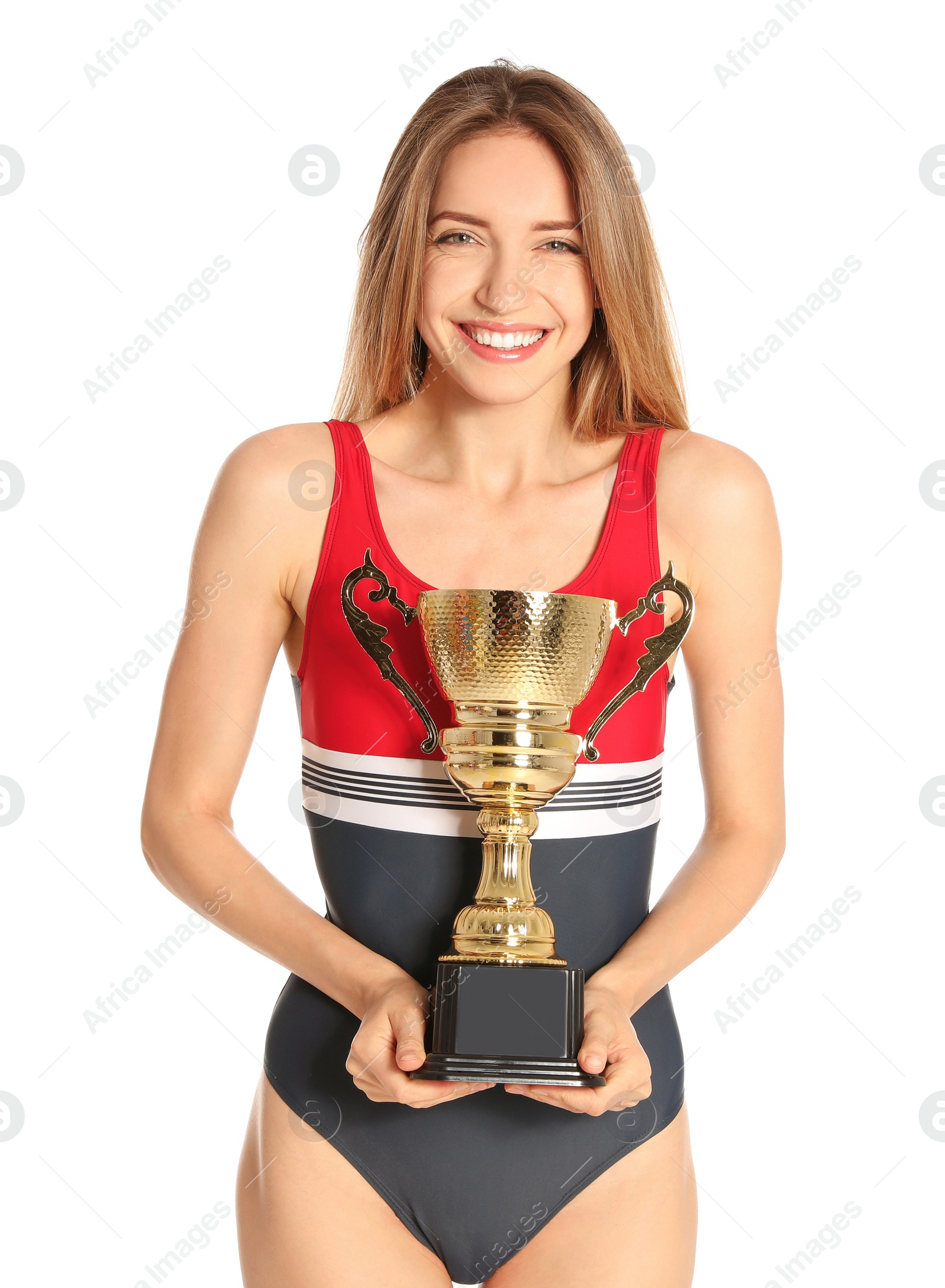 Photo of Happy young woman in swimwear holding golden cup on white background