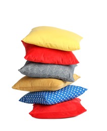 Stack of colorful decorative pillows on white background