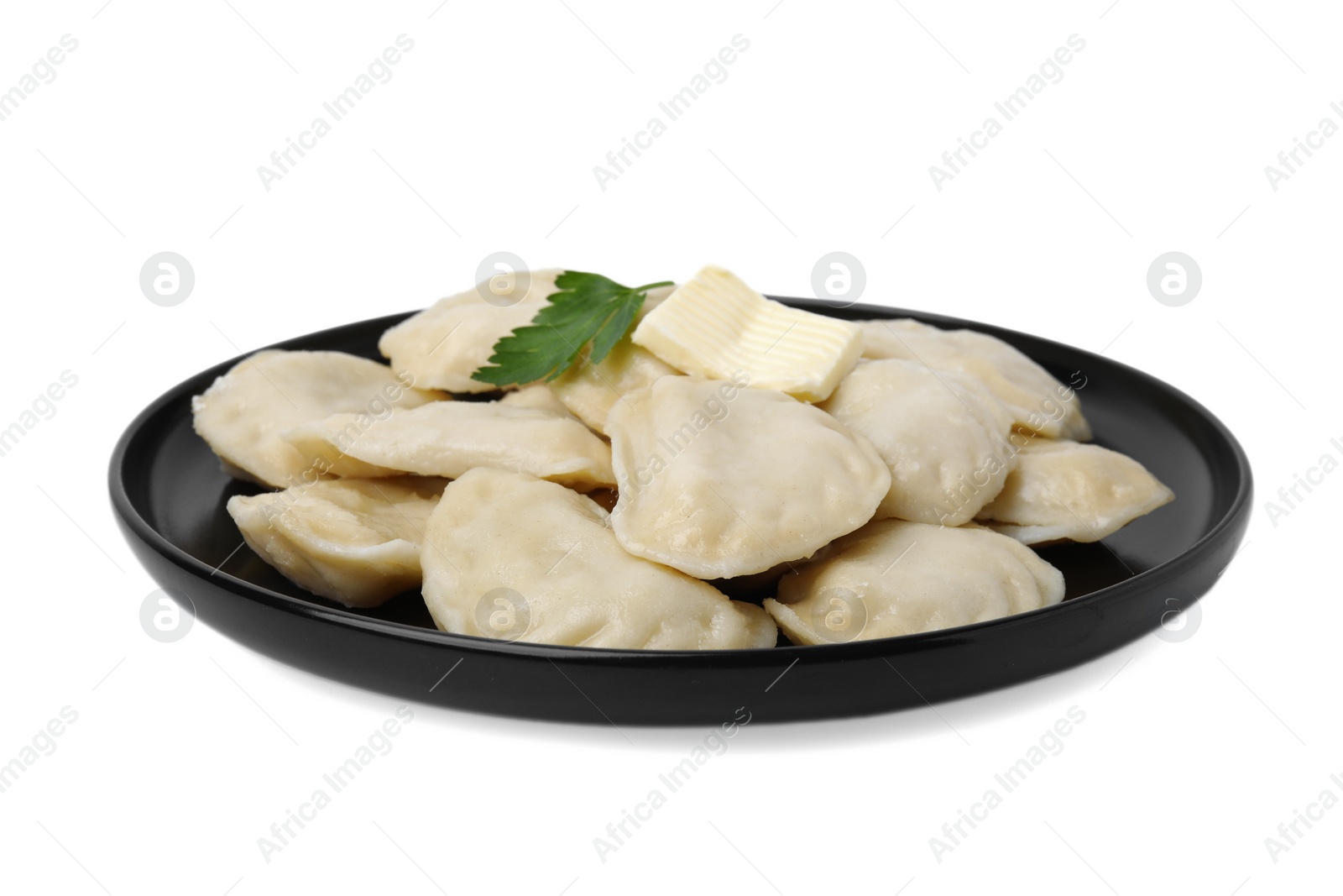 Photo of Delicious dumplings (varenyky) with tasty filling, butter and parsley isolated on white