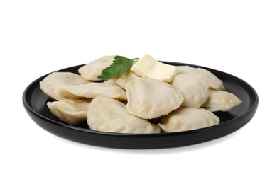 Delicious dumplings (varenyky) with tasty filling, butter and parsley isolated on white