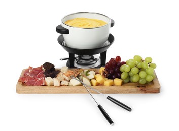 Photo of Fondue with tasty melted cheese, forks and different snacks isolated on white