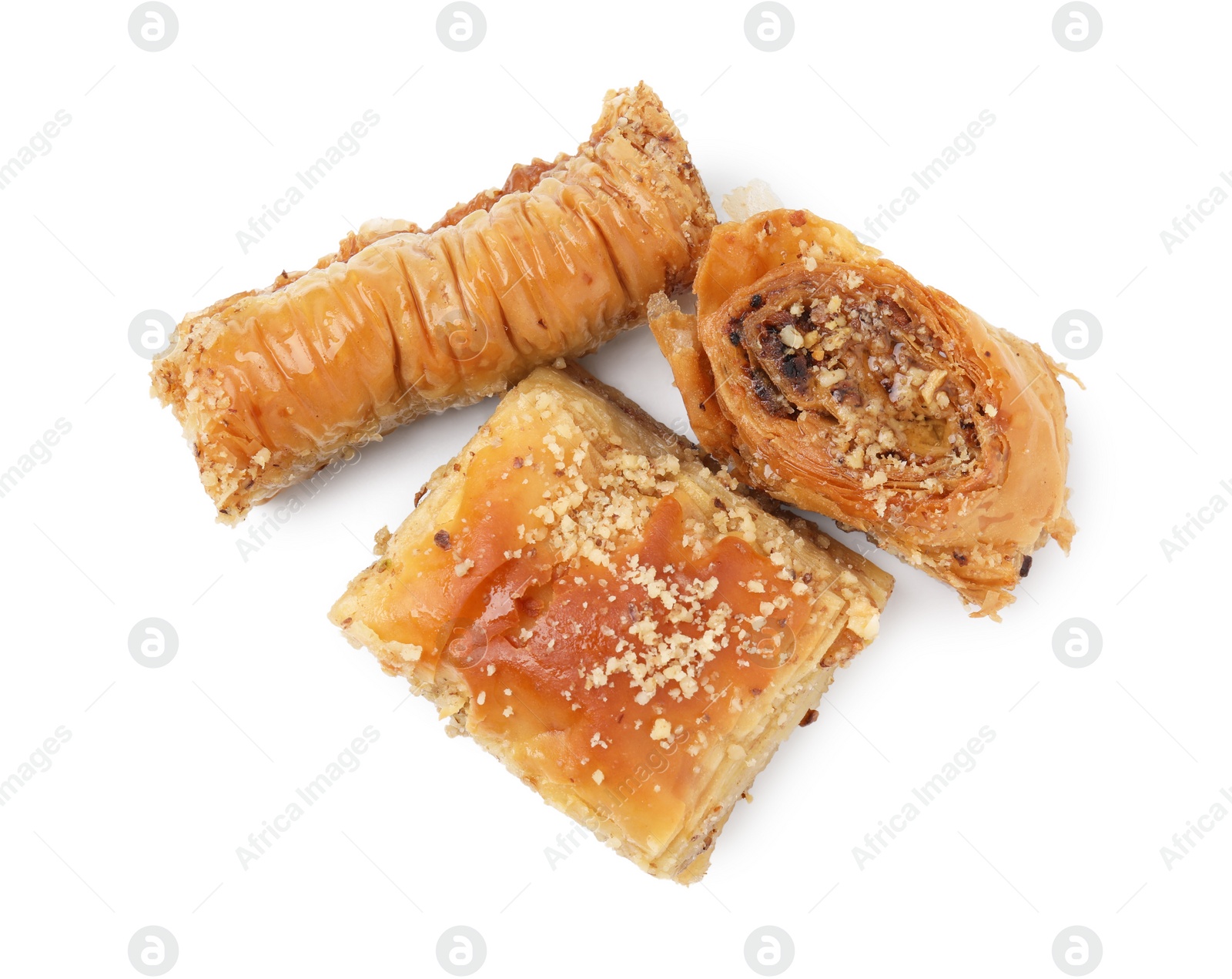 Photo of Eastern sweets. Pieces of tasty baklava isolated on white, top view