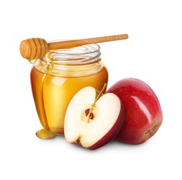 Image of Honey in glass jar, apples and dipper isolated on white