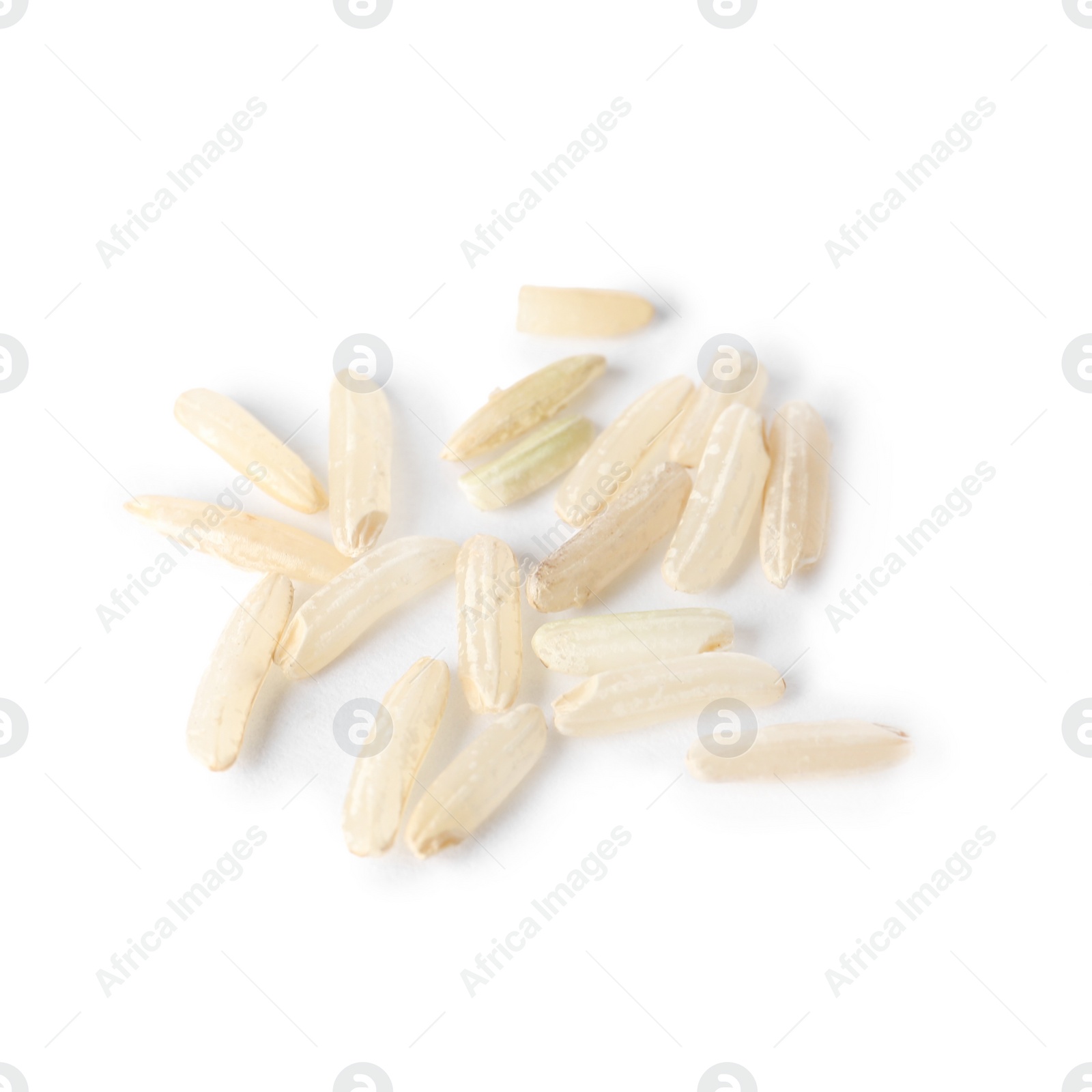 Photo of Uncooked brown rice on white background, closeup view