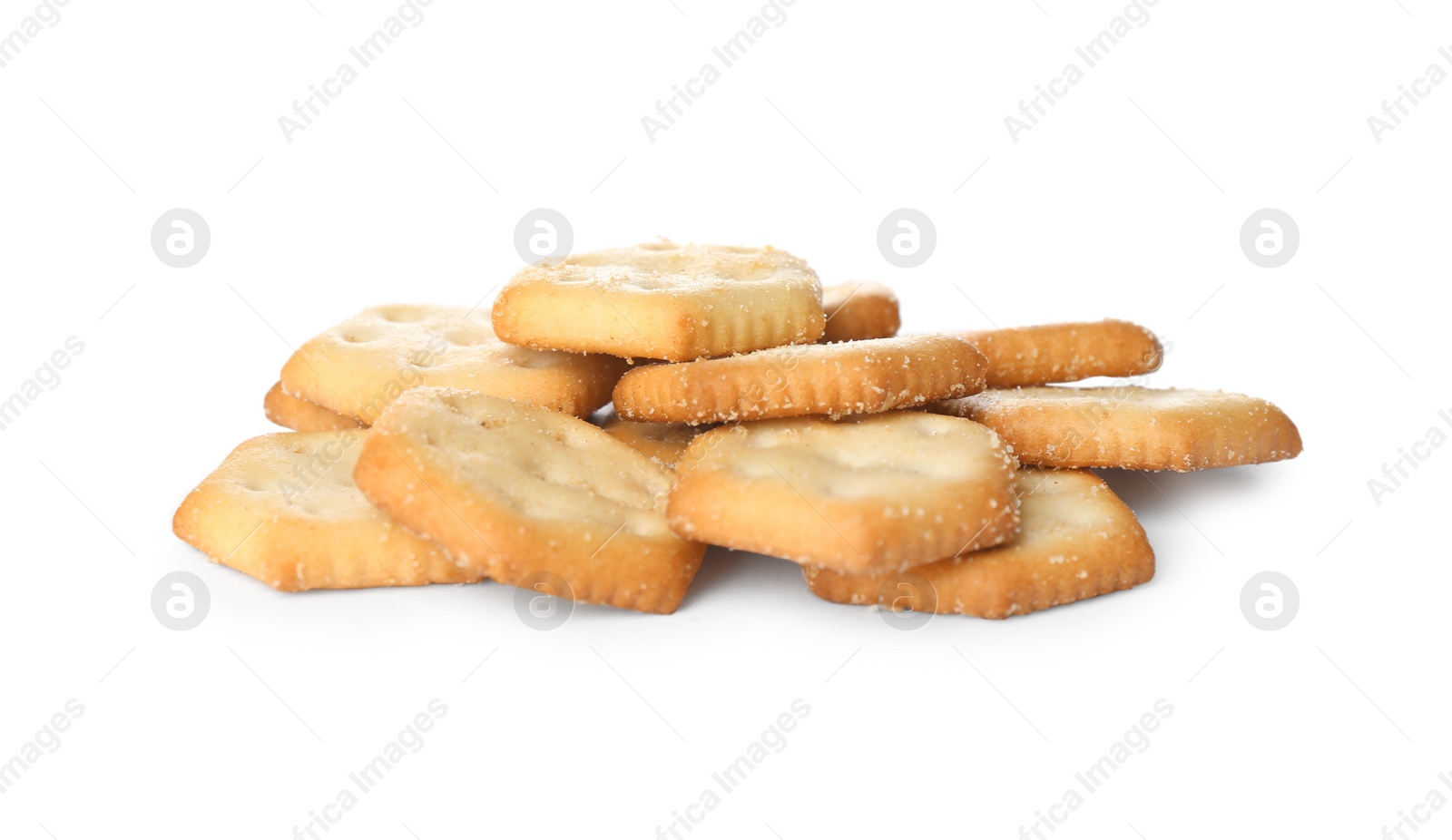 Photo of Crispy crackers isolated on white. Delicious snack