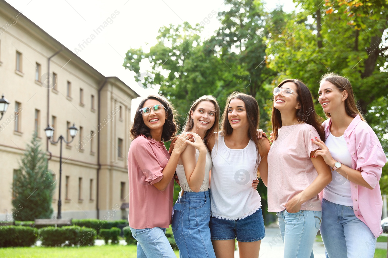 Photo of Happy women outdoors on sunny day. Girl power concept