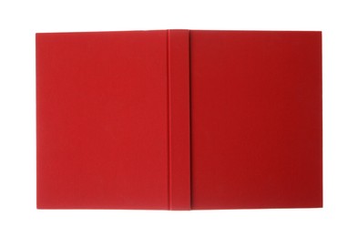 Photo of Open book with red cover on white background, top view