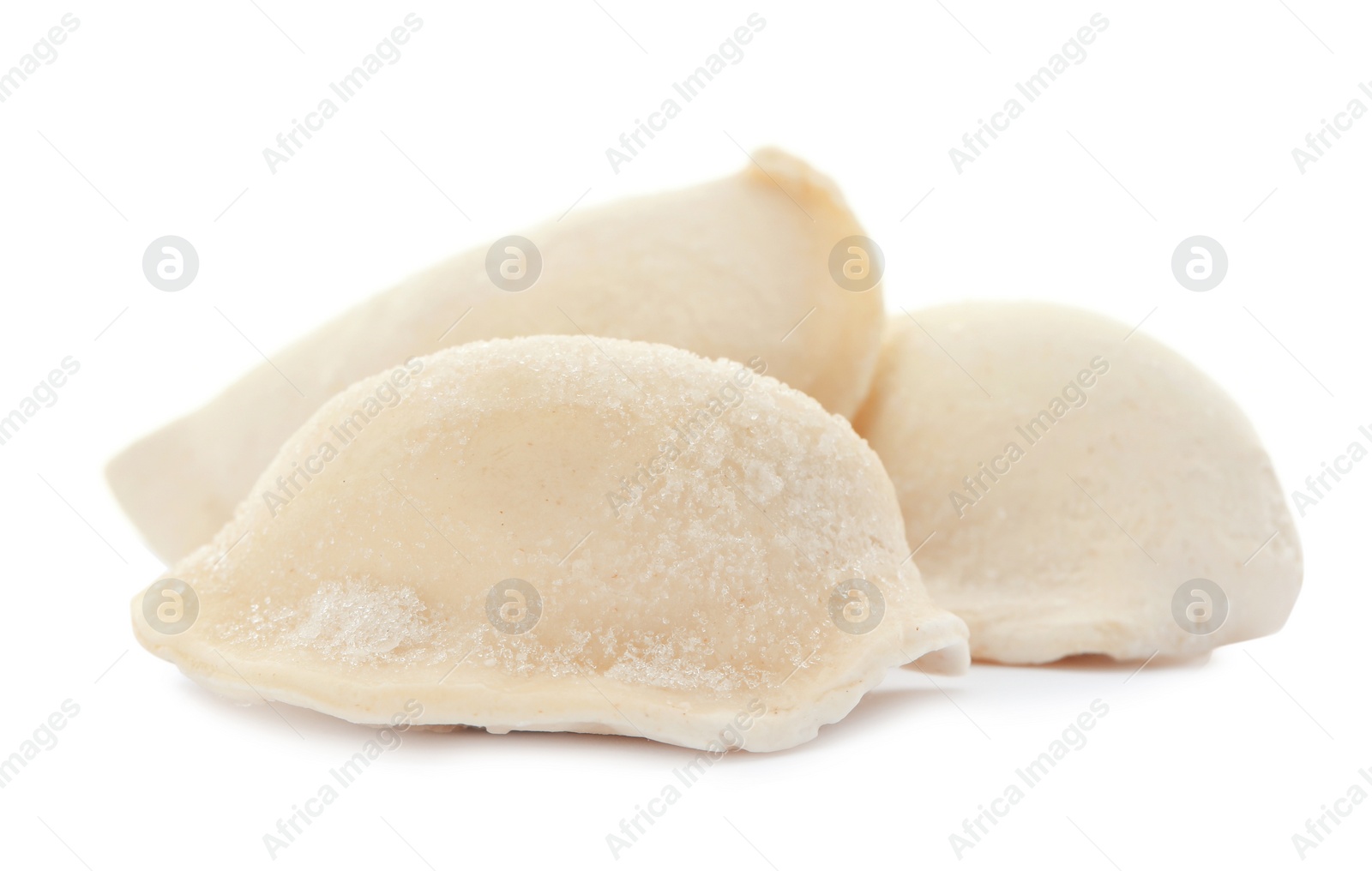 Photo of Raw dumplings with tasty filling on white background