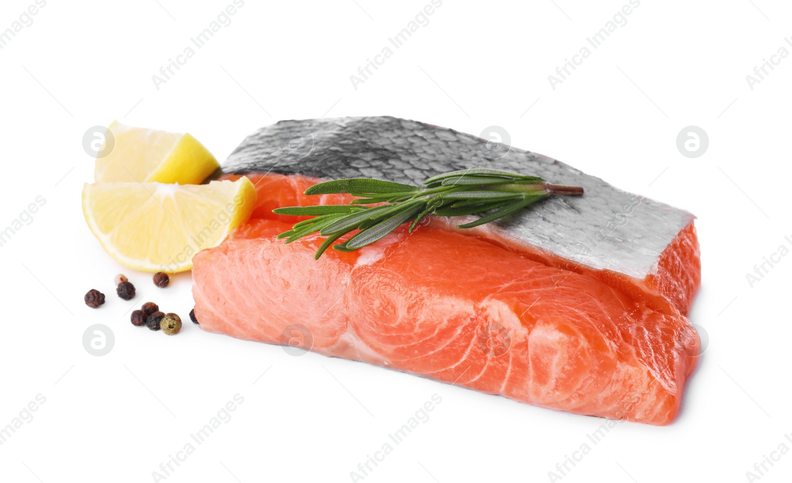 Photo of Pieces of fresh raw salmon, spices and lemon slices on white background