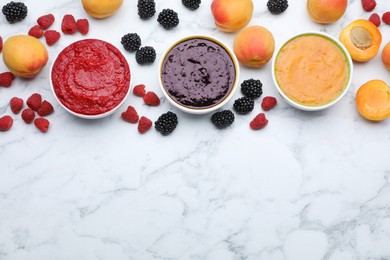 Different puree in bowls and fresh ingredients on white marble table, flat lay. Space for text