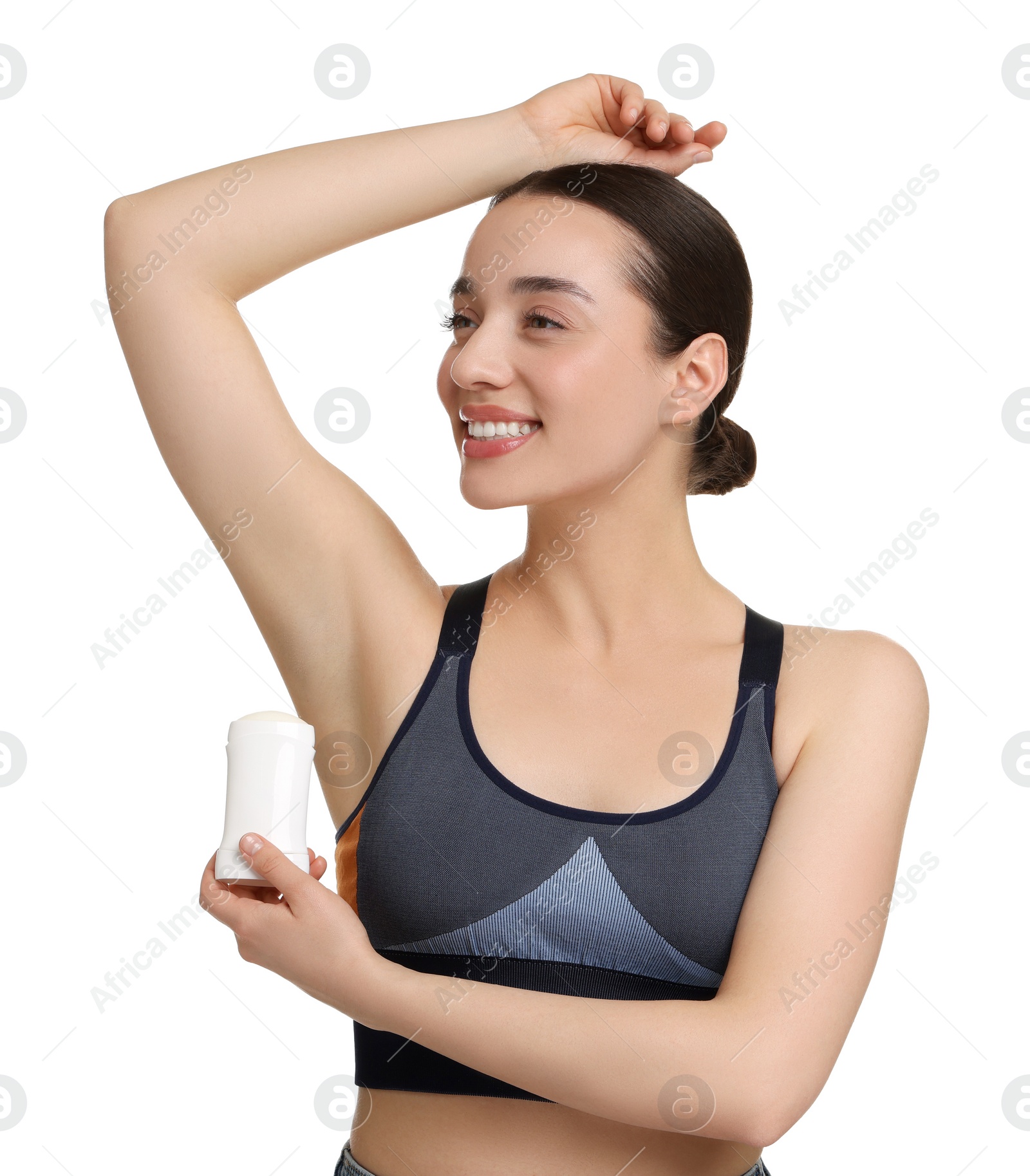 Photo of Beautiful woman applying deodorant on white background