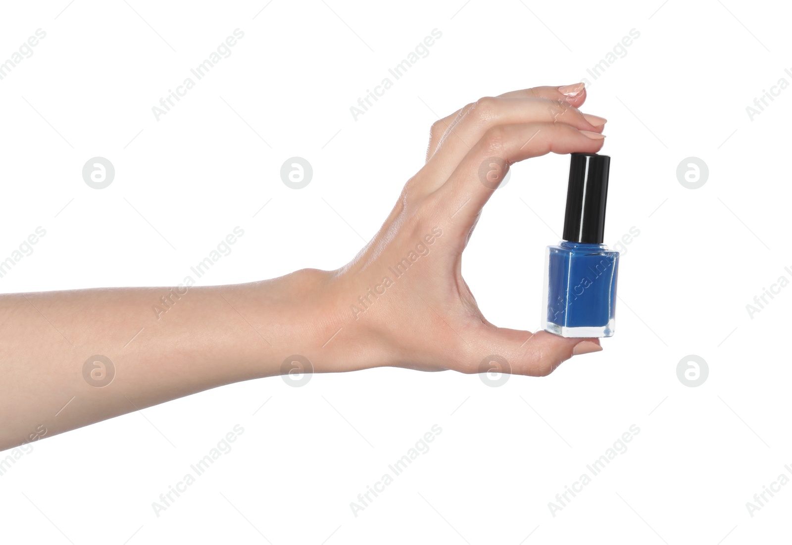 Photo of Woman holding nail polish on white background, closeup