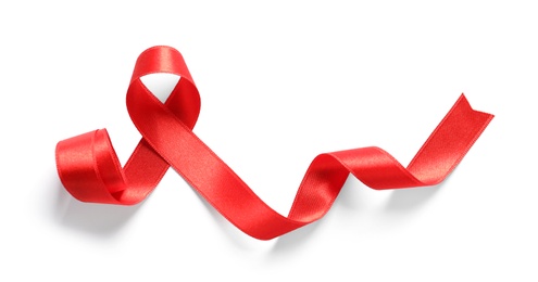 Photo of Red ribbon on white background, top view. Cancer awareness