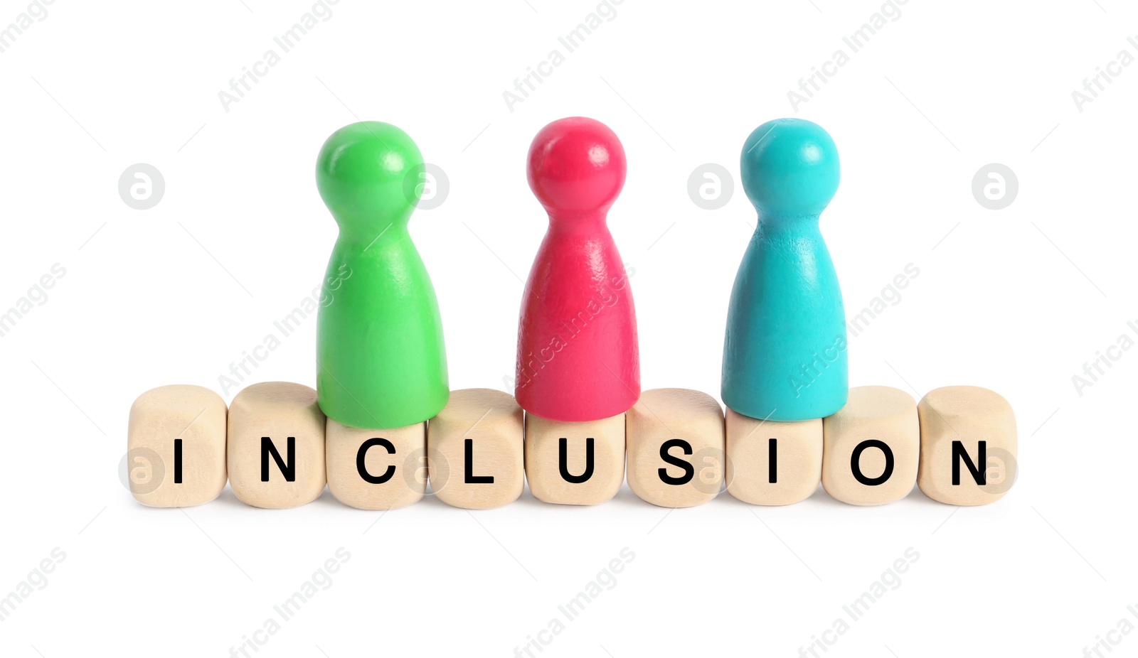 Photo of Colorful pawns and wooden cubes with word Inclusion on white background