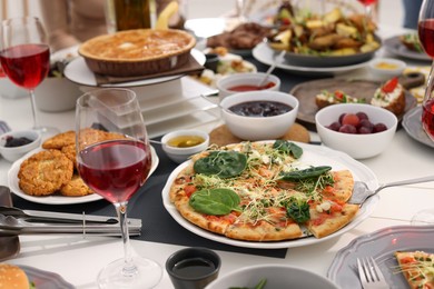 Brunch table setting with different delicious food