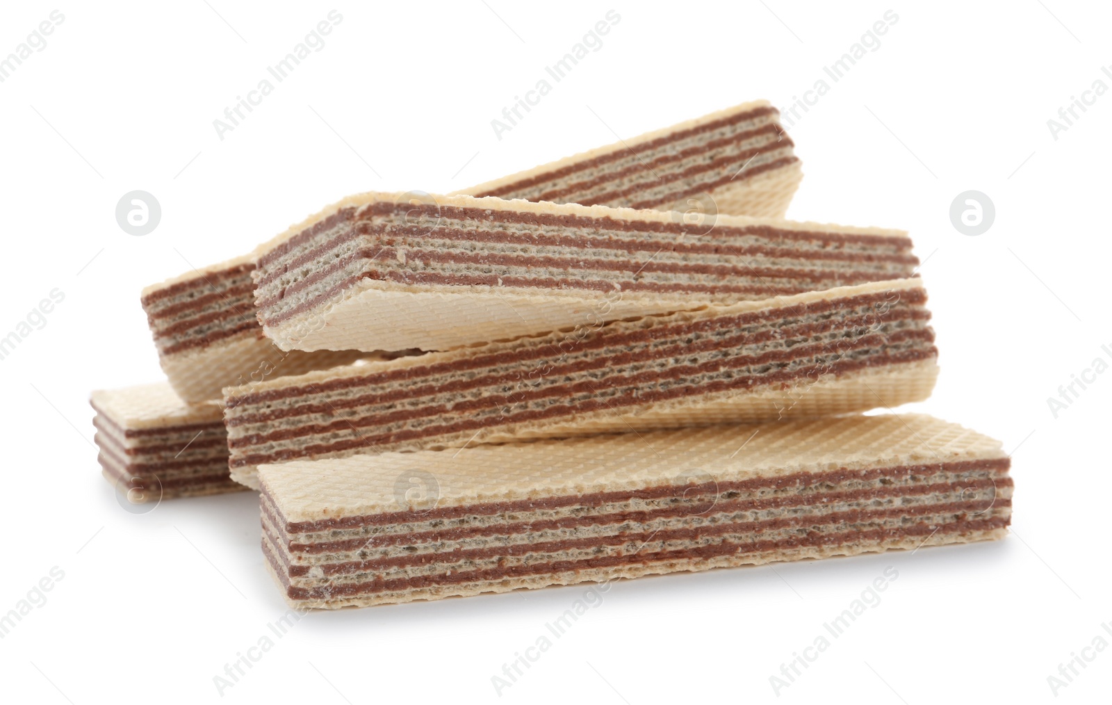 Photo of Delicious crispy wafers on white background. Sweet food