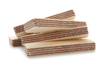 Photo of Delicious crispy wafers on white background. Sweet food