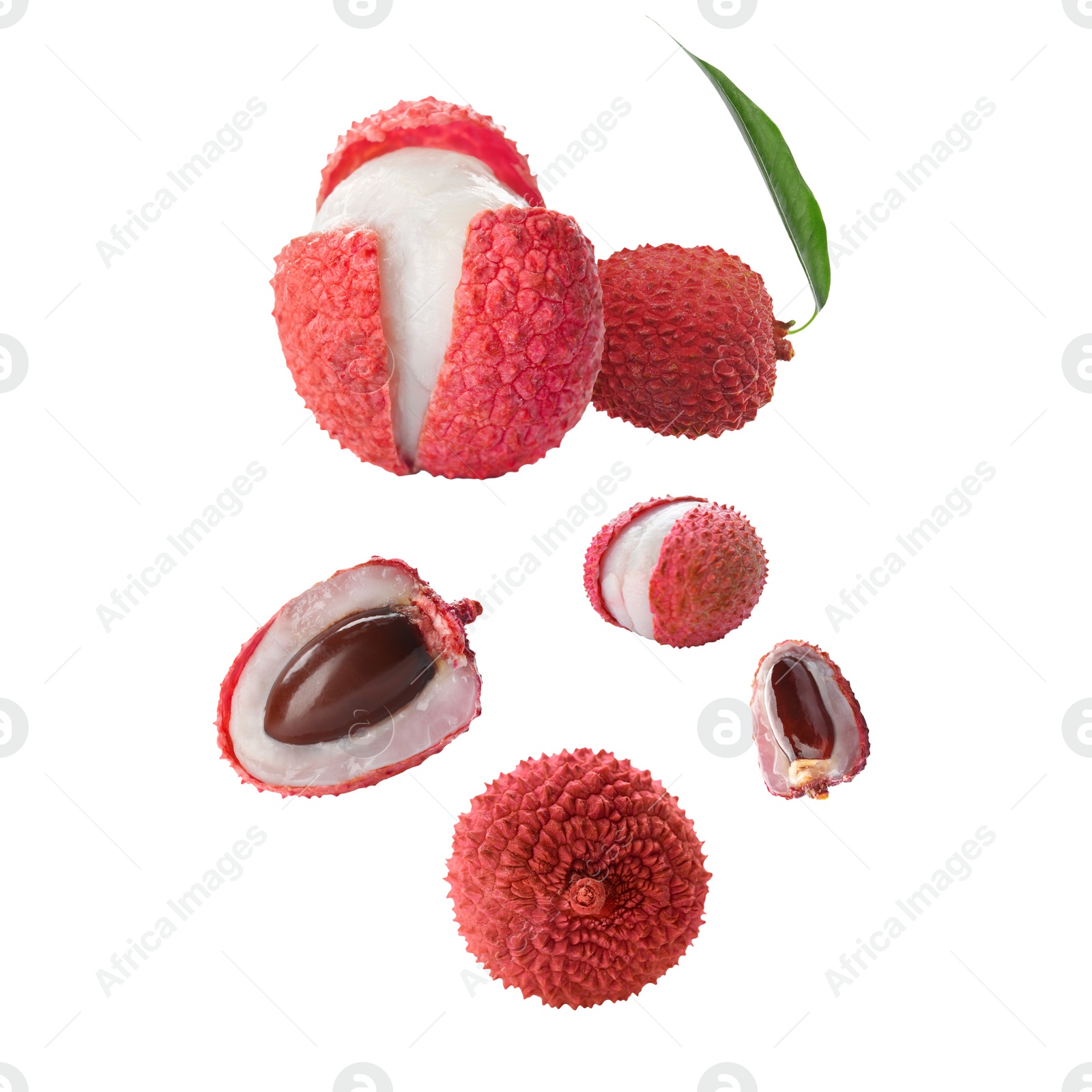 Image of Many lychees falling on white background. Exotic fruit