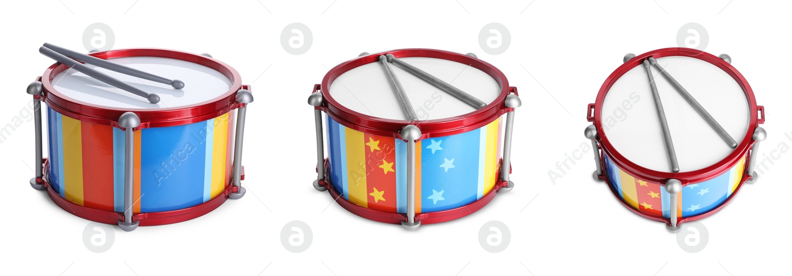 Image of Bright toy drums and sticks on white background, set