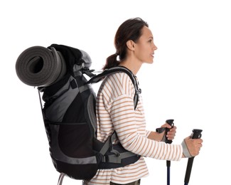 Female hiker with backpack and trekking poles on white background