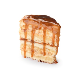 Photo of Piece of delicious homemade cake with caramel sauce white background