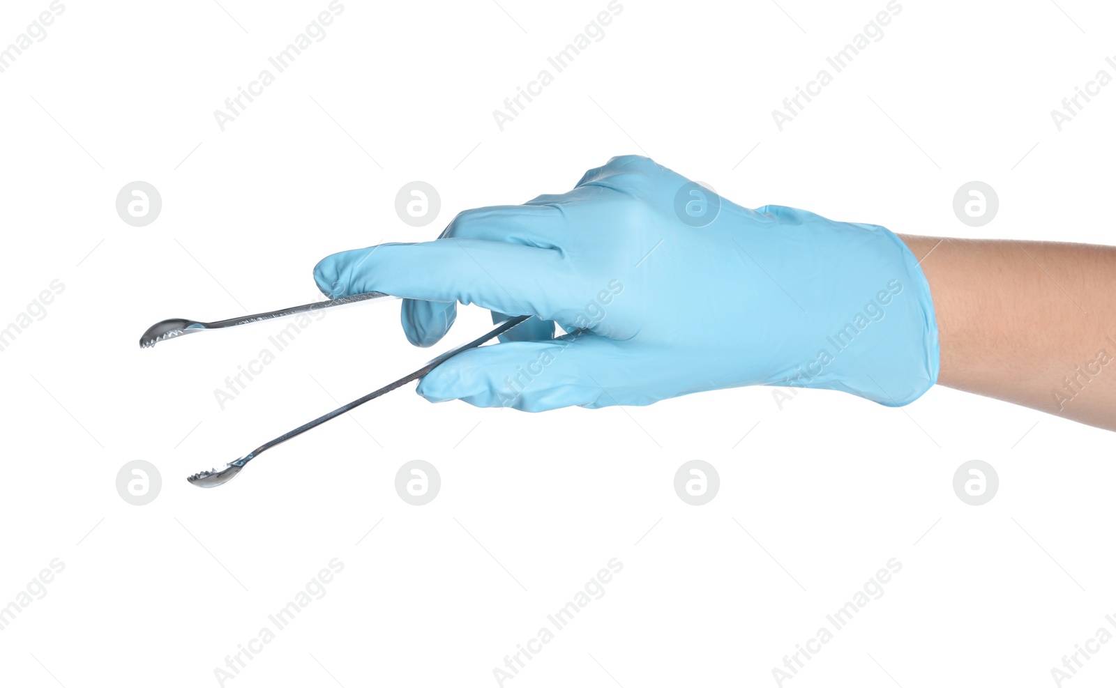 Photo of Doctor in sterile glove holding medical forceps on white background