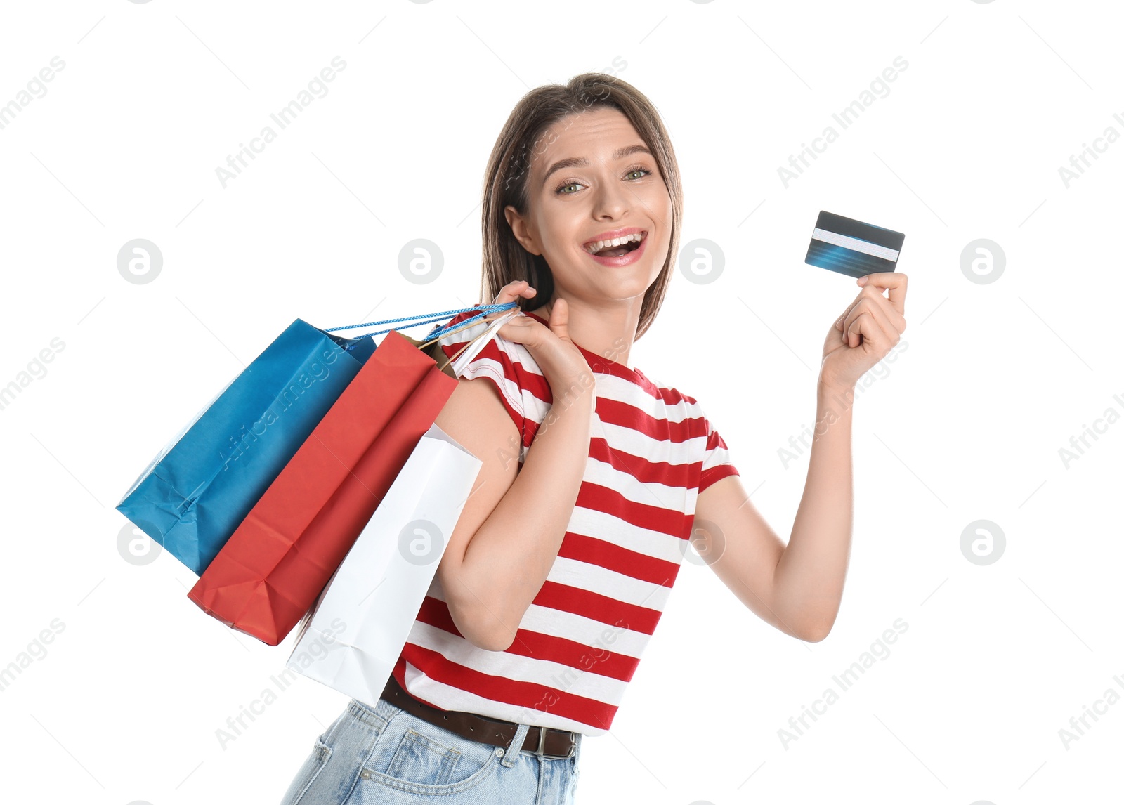 Photo of Young woman with credit card and shopping bags on white background. Spending money