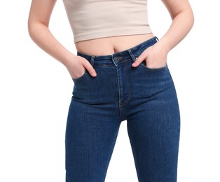 Photo of Woman in stylish jeans on white background, closeup