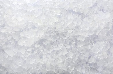 Clear crushed ice as background, top view