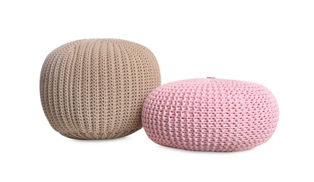 Photo of Different stylish poufs on white background. Home design