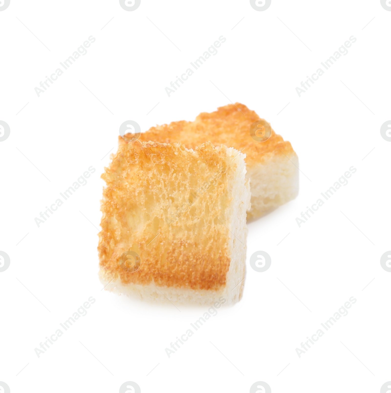Photo of Two delicious crispy croutons on white background