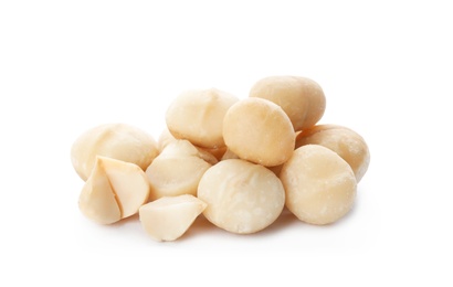 Shelled organic Macadamia nuts on white background