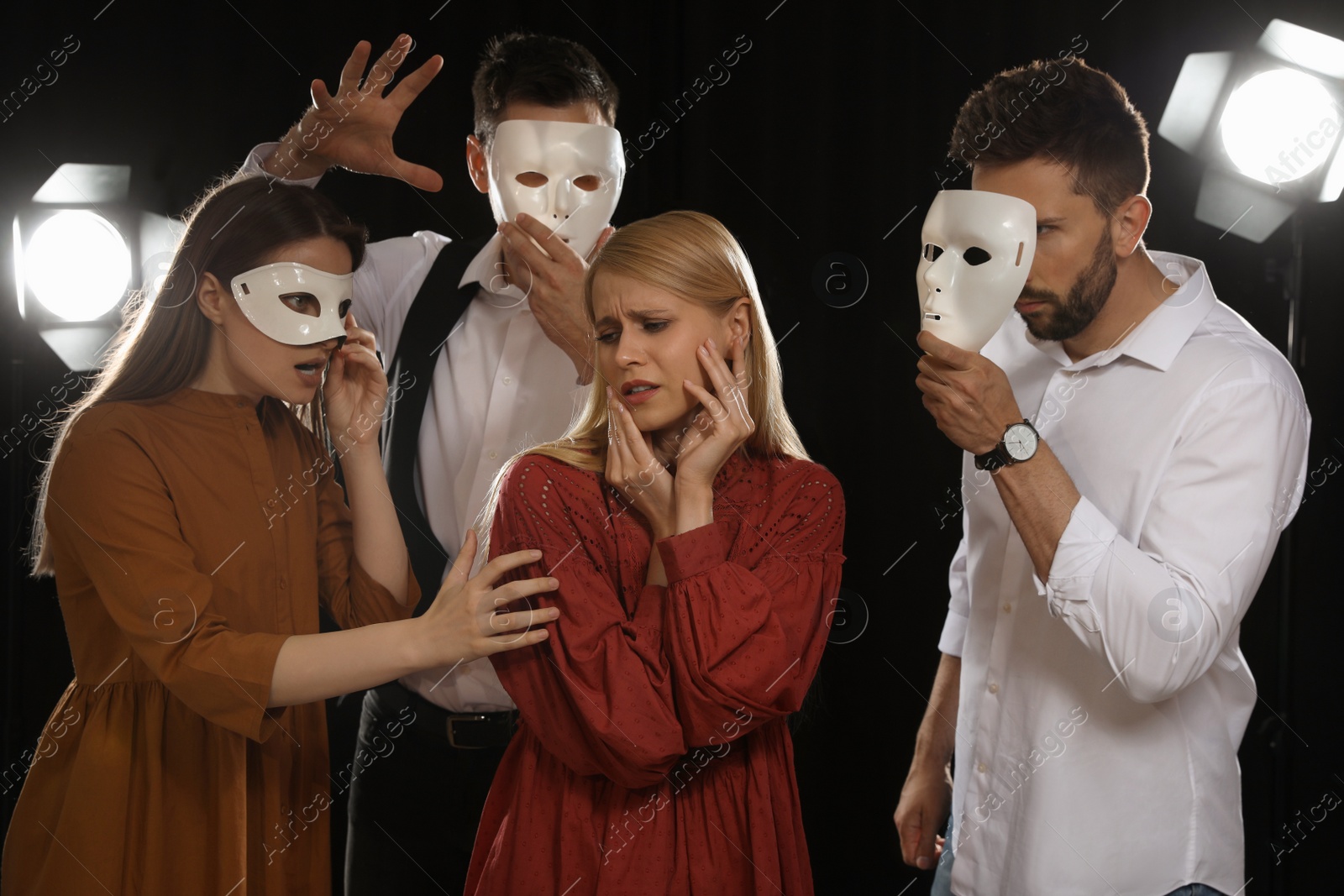 Photo of Professional actors rehearsing on stage in theatre