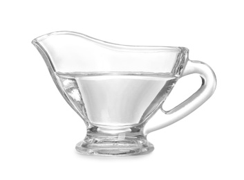 Photo of Gravy boat with vinegar on white background